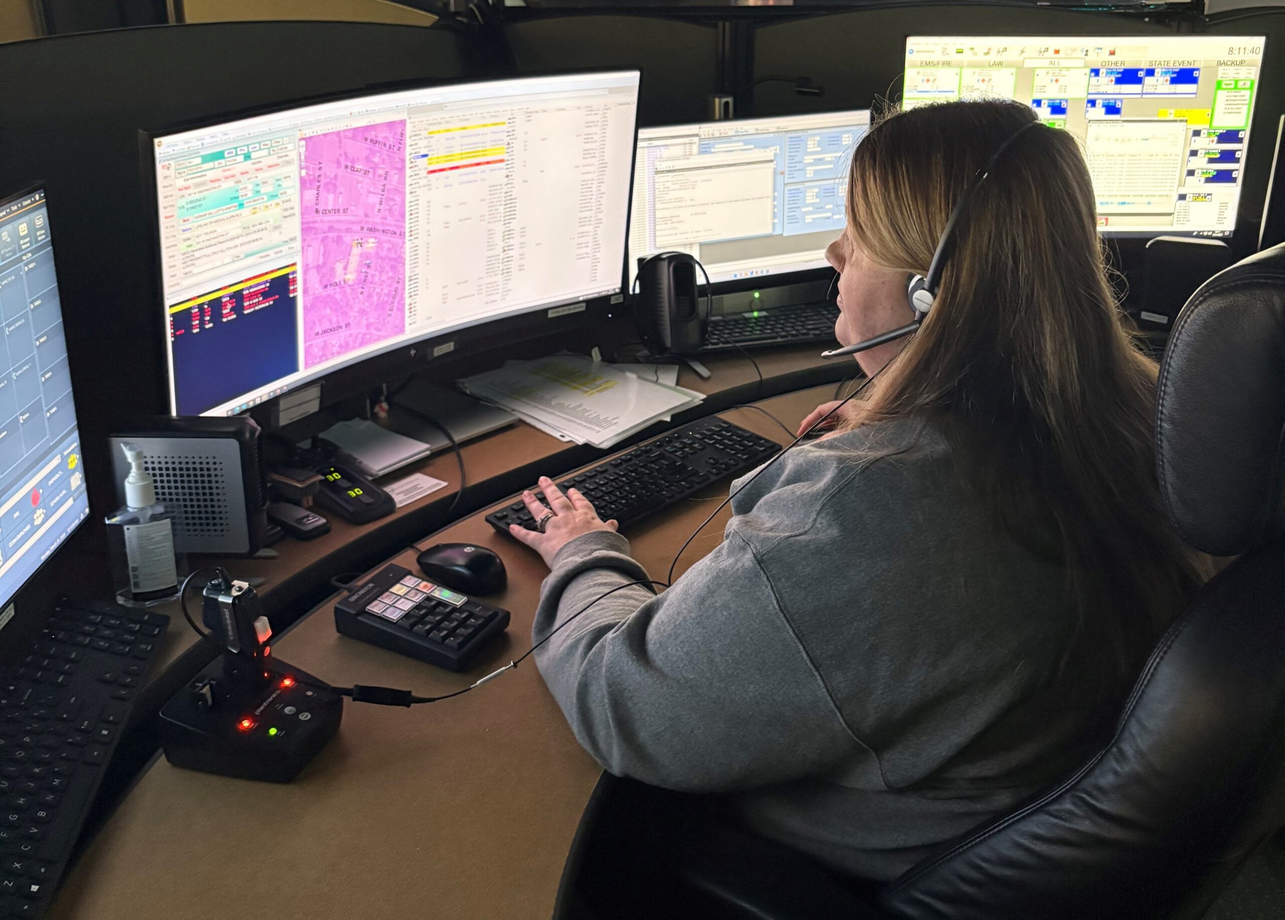 911 operator working at desk