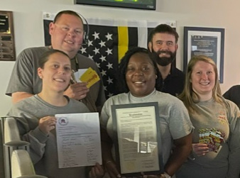 911 team members with awards